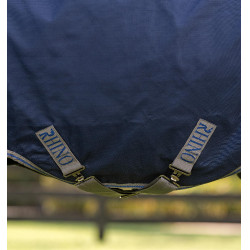 Couverture Horseware Rhino Poney Turnout 250g VL 1000D Noir / gris titane / bleu classique Couverture Horseware Rhino Poney Turnout 250g VL 1000D Noir / gris titane / bleu classique
